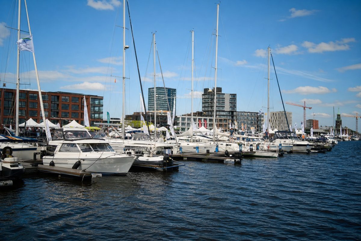 Boats moored side by side on an Amsterdam waterway